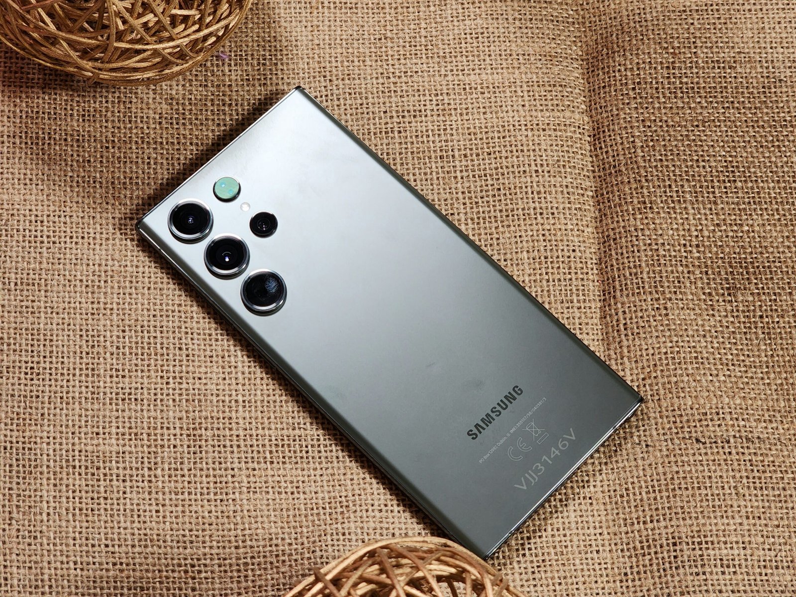 a close up of a cell phone on a cloth